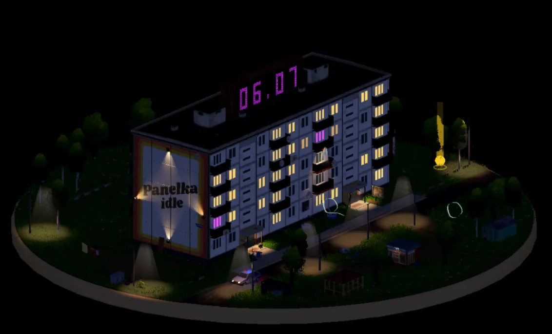 A complete nighttime view of the apartment building with illuminated windows and streetlights.
